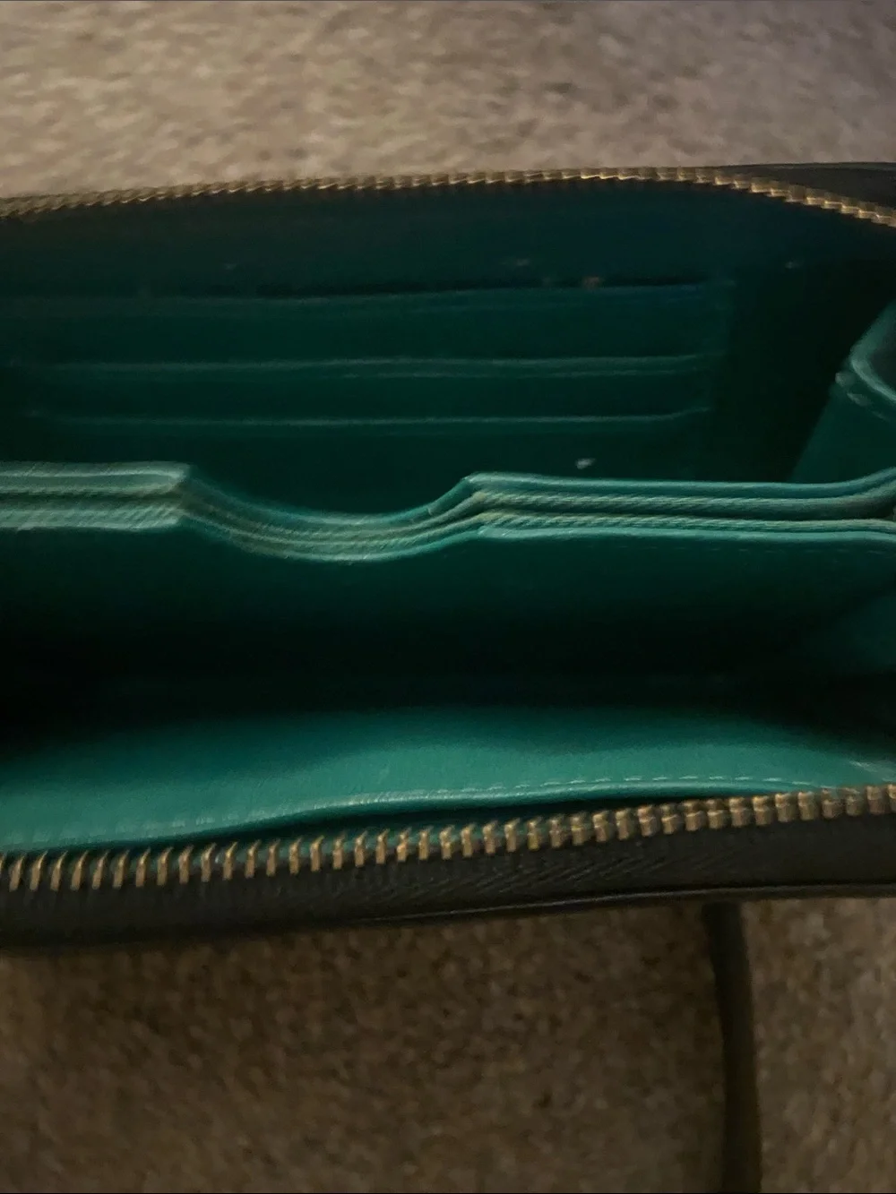 Fossil Black Leather Zip Wristlet with Gold Accent, gently used lots of life.